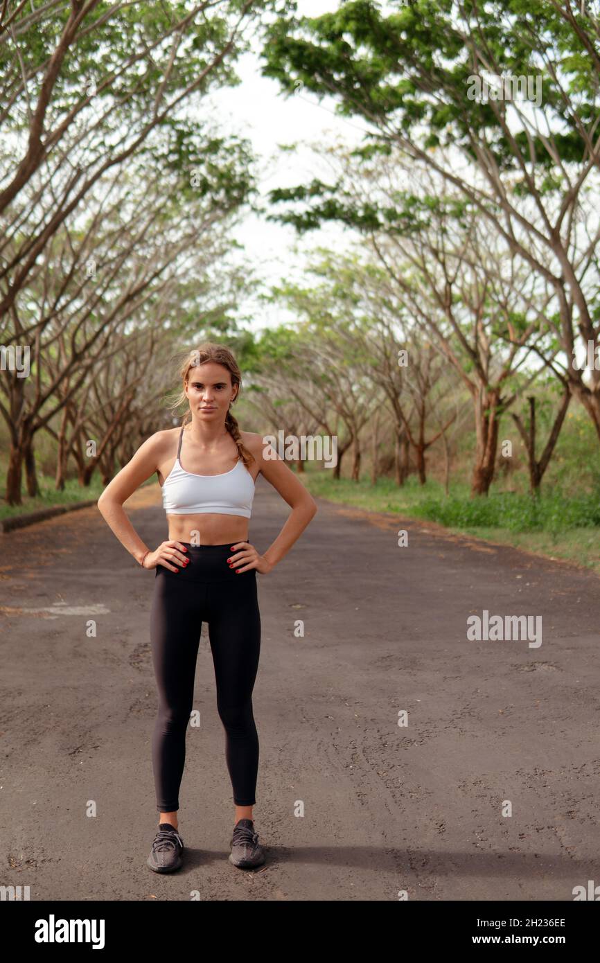 Woman stretching in woods hi-res stock photography and images - Alamy