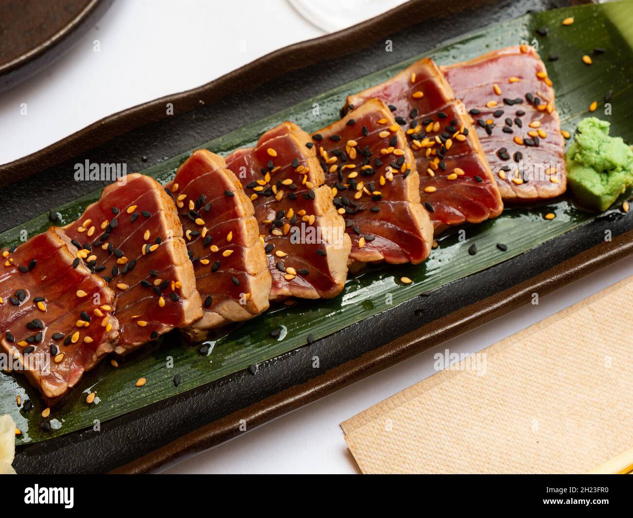 Popular Japanese dish Tataki from tuna with an appetizing ponzu sauce Stock Photo Alamy