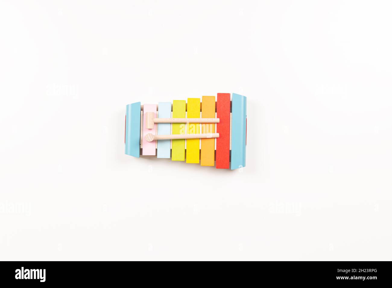 Top view to colorful wooden xylophone with sticks on white background.  Early education for kids. Learning music for children. Educational  Montessori Stock Photo - Alamy
