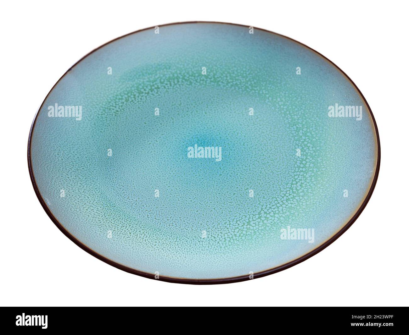 Blue plate with brown border Stock Photo Alamy