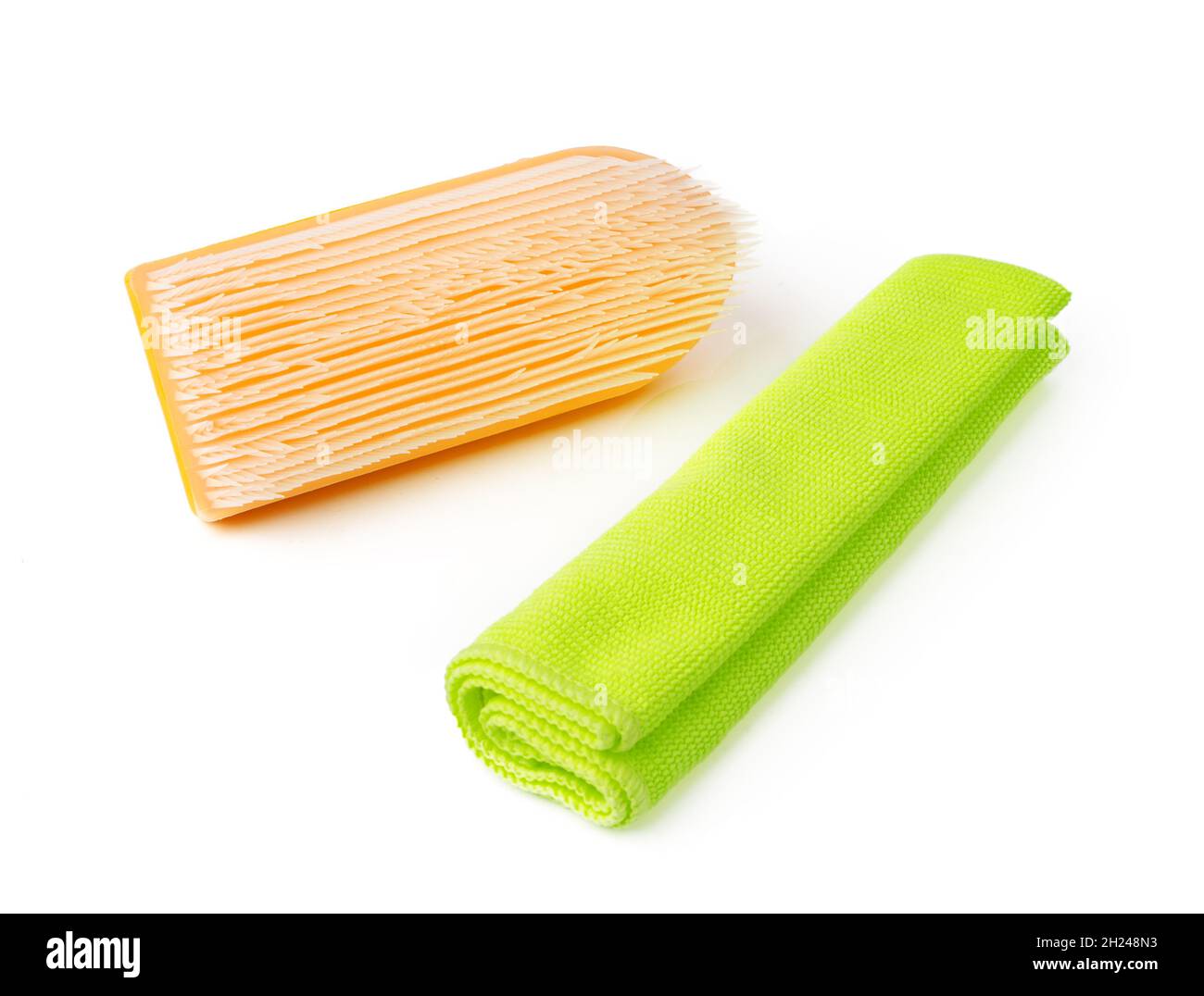 Cleaning brush and cloth isolated on white background Stock Photo - Alamy