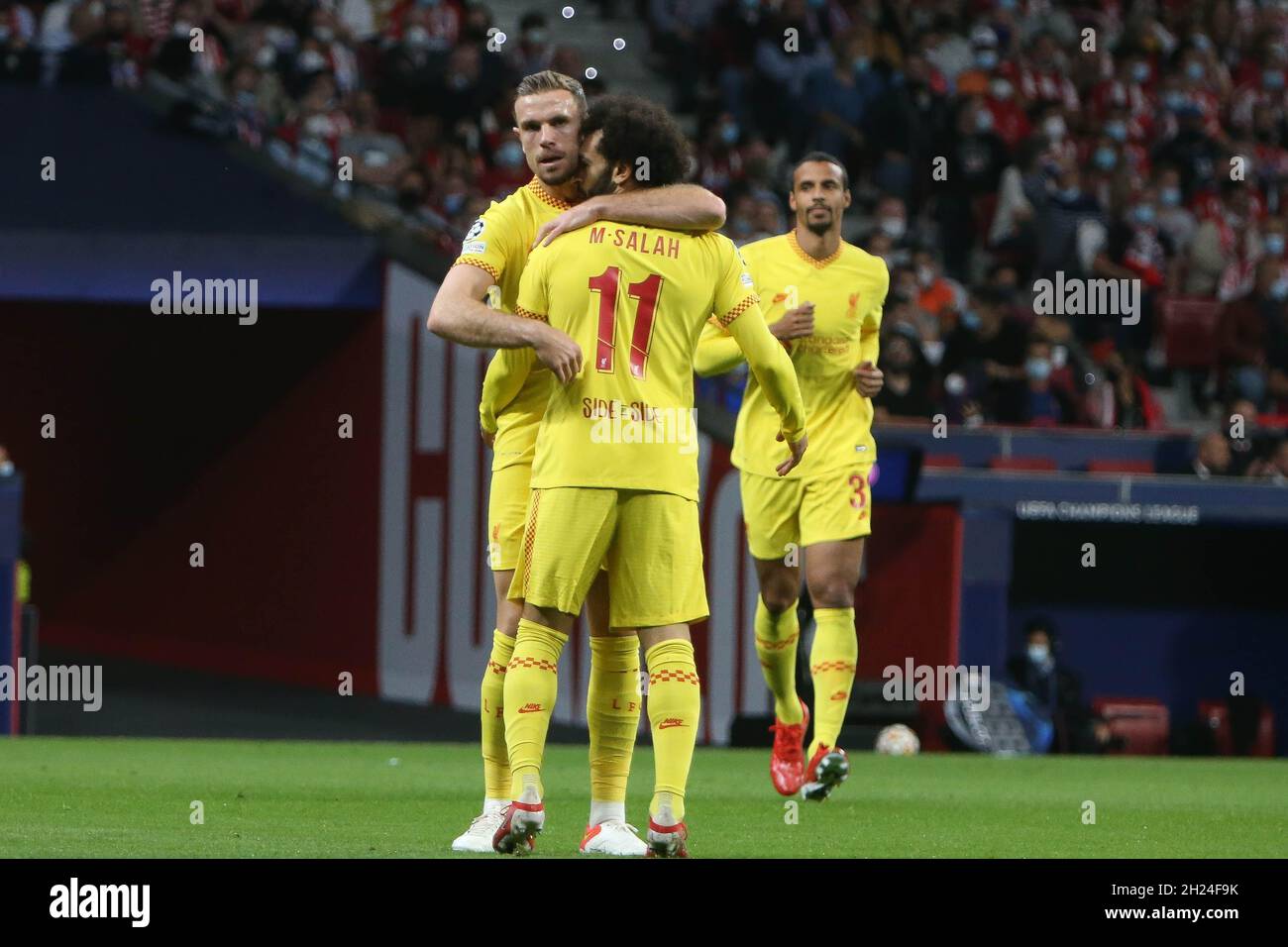Mohamed Salah of FC Liverpool celebrates after scoring with Jordan Henderson during the UEFA Champions League, Group B football match between Atletico Madrid and Liverpool on October 19, 2021 at Wanda Metropolitano stadium in Madrid, Spain - Photo: Laurent Lairys/DPPI/LiveMedia Stock Photo