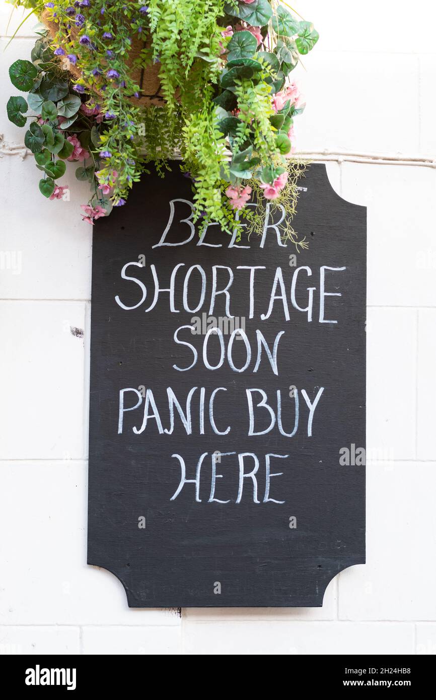 panic-buying humorous sign 'Beer Shortage Soon Panic Buy Here', outside The Eagle Inn, Dunbar, Scotland, UK Stock Photo