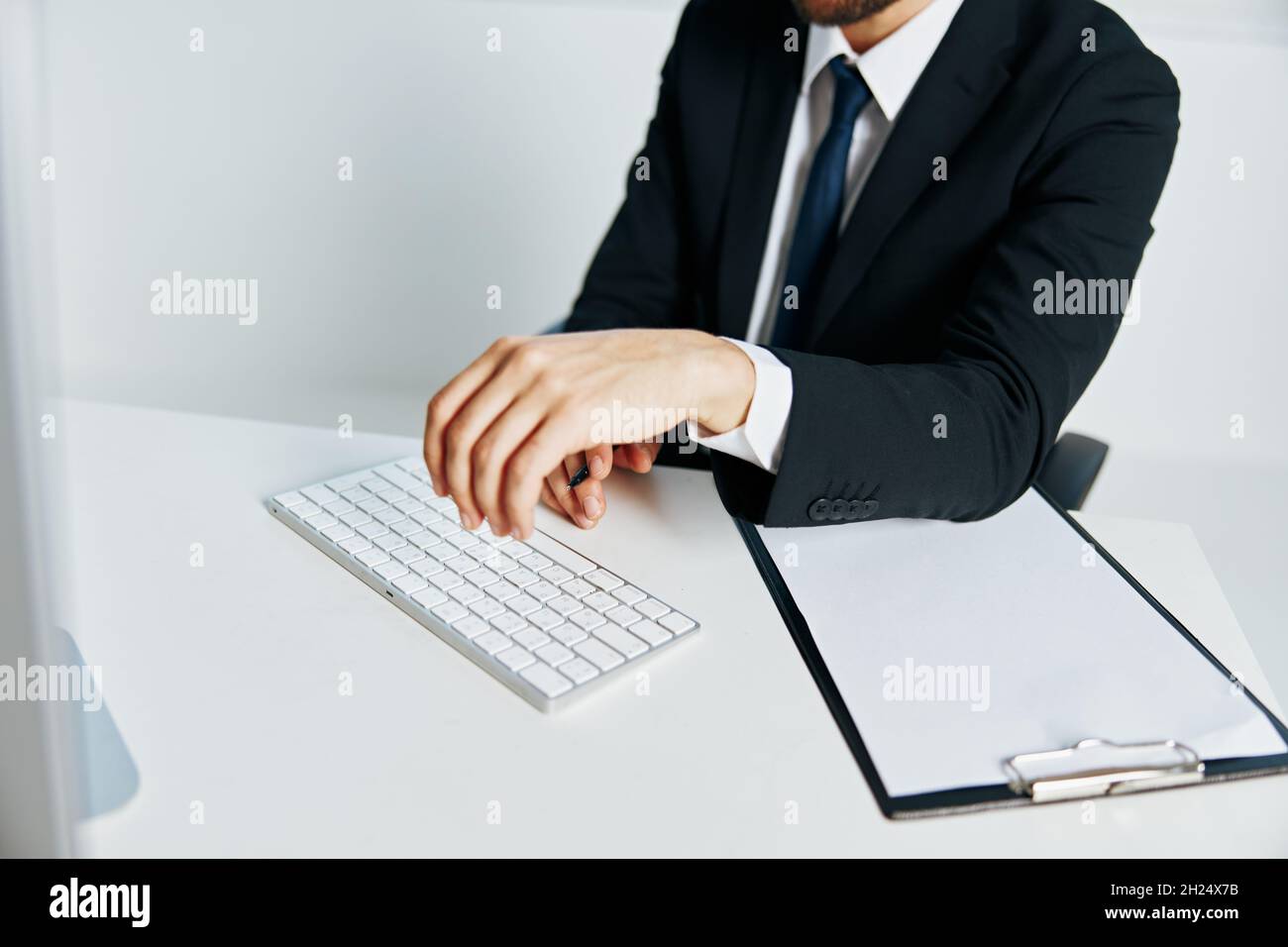 office worker documents in hand communication by phone Chief Stock Photo Alamy