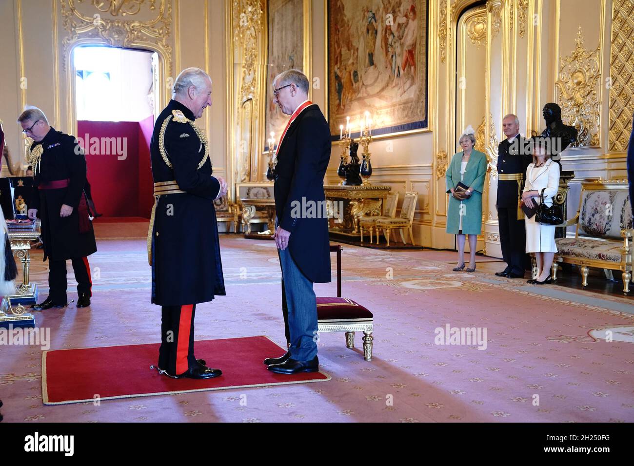 Sir Philip May, the husband of former prime minister Theresa May, is knighted for political service by the Prince of Wales during an investiture ceremony at Windsor Castle. Picture date: Wednesday October 20, 2021. Stock Photo
