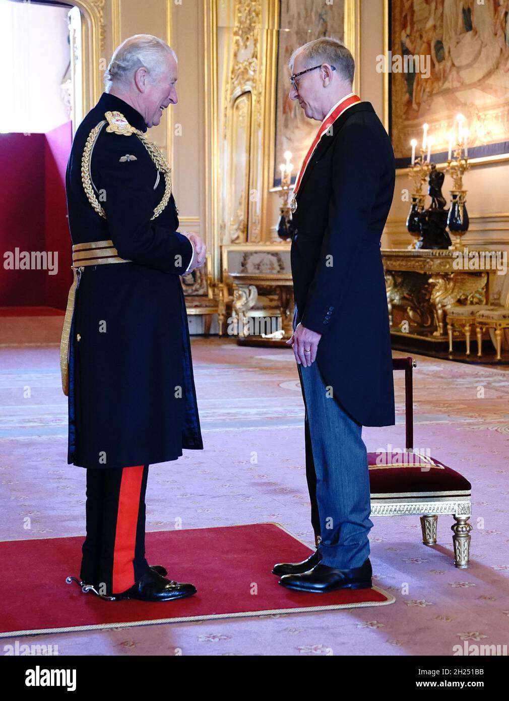 Sir Philip May, the husband of former prime minister Theresa May, is knighted for political service by the Prince of Wales during an investiture ceremony at Windsor Castle. Picture date: Wednesday October 20, 2021. Stock Photo
