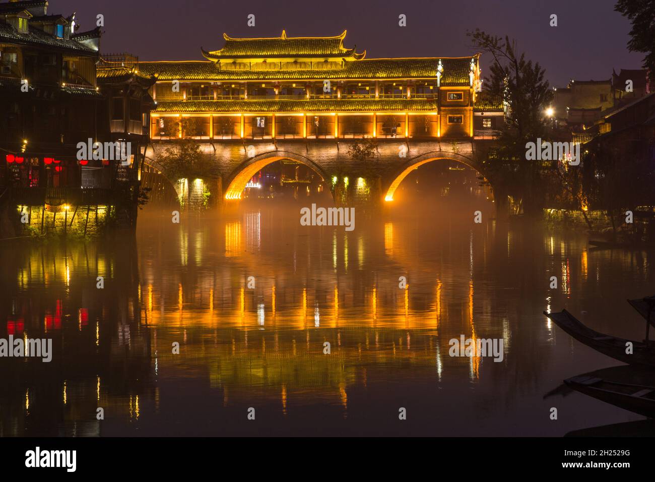 The Phoenix Hong or Hongqiao Bridge was built in the MIao style over the Tuojing River, Fenghuang, China. Stock Photo