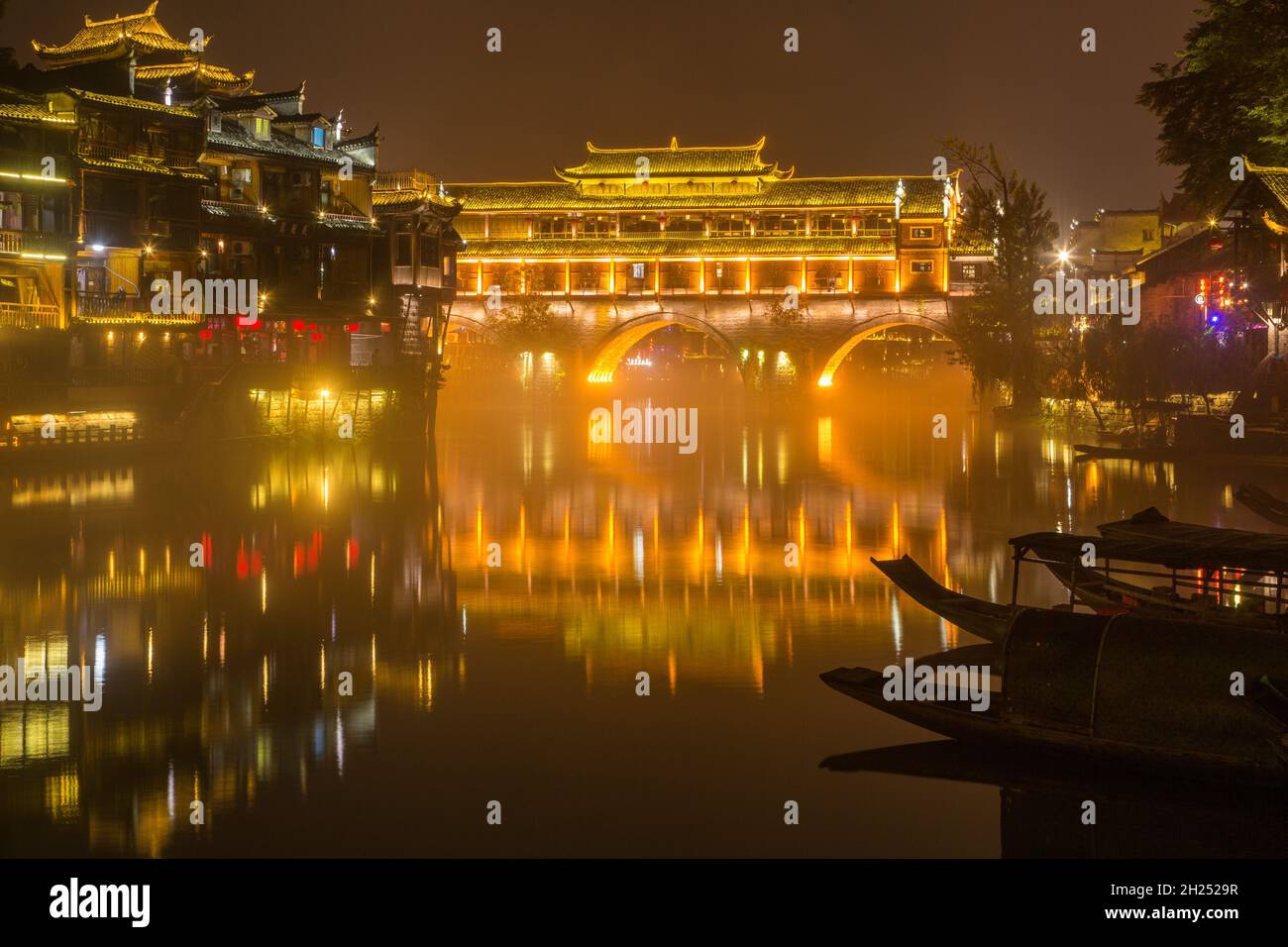 The Phoenix Hong or Hongqiao Bridge was built in the MIao style over the Tuojing River, Fenghuang, China. Stock Photo
