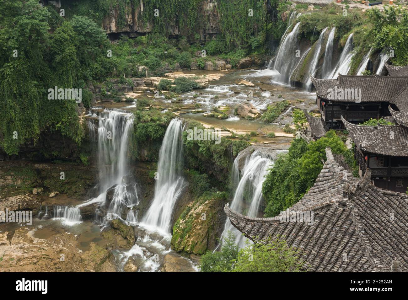 The Wangcun Waterfall separates the ancient town of Furong in Hunan Province, China. Stock Photo