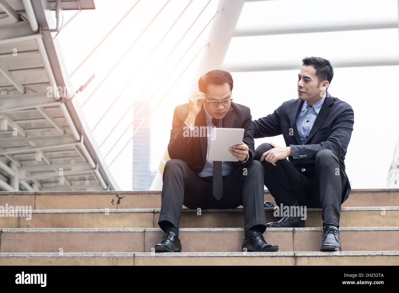 man lose a job sitting, dark sad and sadness emotion, stress and trouble people upset and no job because of covid 19 or coronavirus. Stock Photo