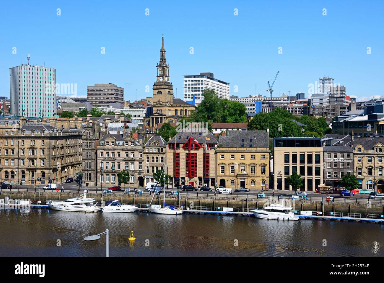 View across the River Tyne towards Newcastle upon Tyne Saint Willibrord with All Saints clock tower to the centre, Newcastle upon Tyne, UK. Stock Photo