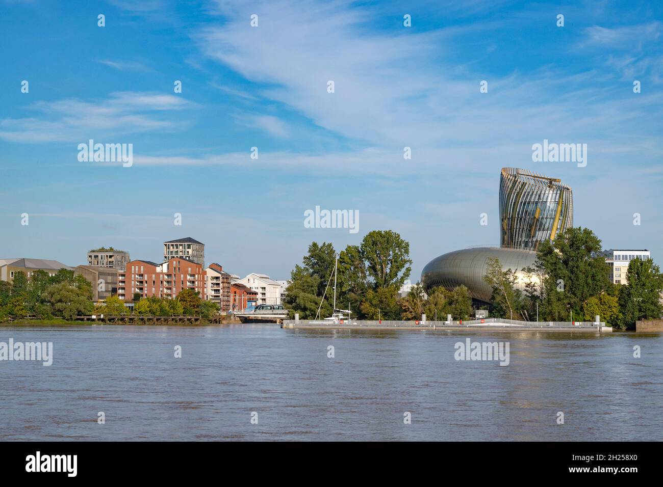 The entrance of the Bassins à flot and the cité du vin seen from the right bank of the Garonne river in Bordeaux. France Stock Photo
