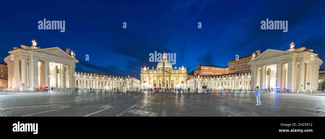 St. Peter's Basilica and Bernini's Colonnade at night Stock Photo