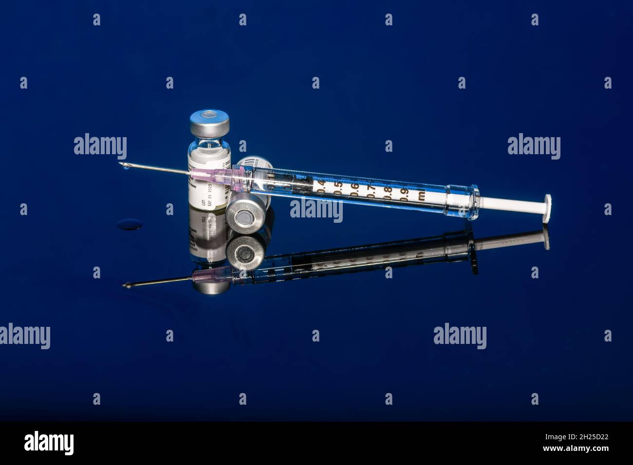 Syringe with vials and Needle Stock Photo