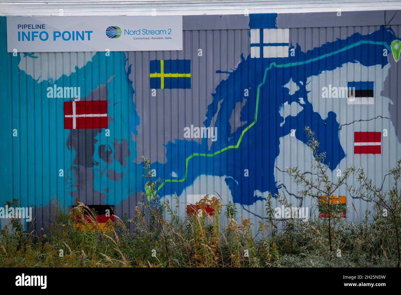 Lubmin Germany 20th Oct 2021 A Sign Reading Info Point Nord Stream 2 Committed Reliable Safe Hangs Above A Painted Map At The Natural Gas Receiving Station In The Lubmin Industrial Estate