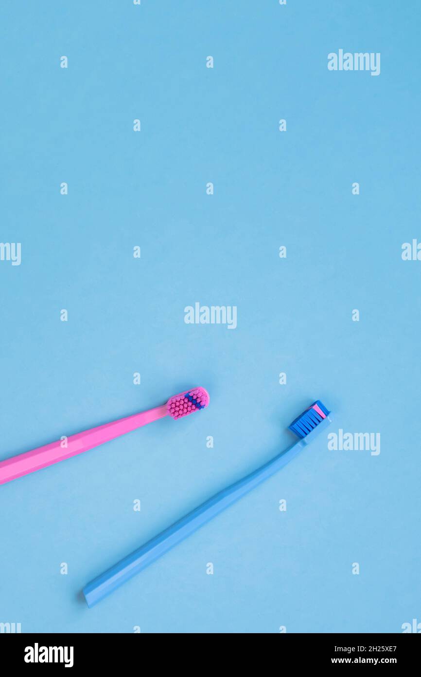 Teeth hygiene and oral dental care products on blue color background ...