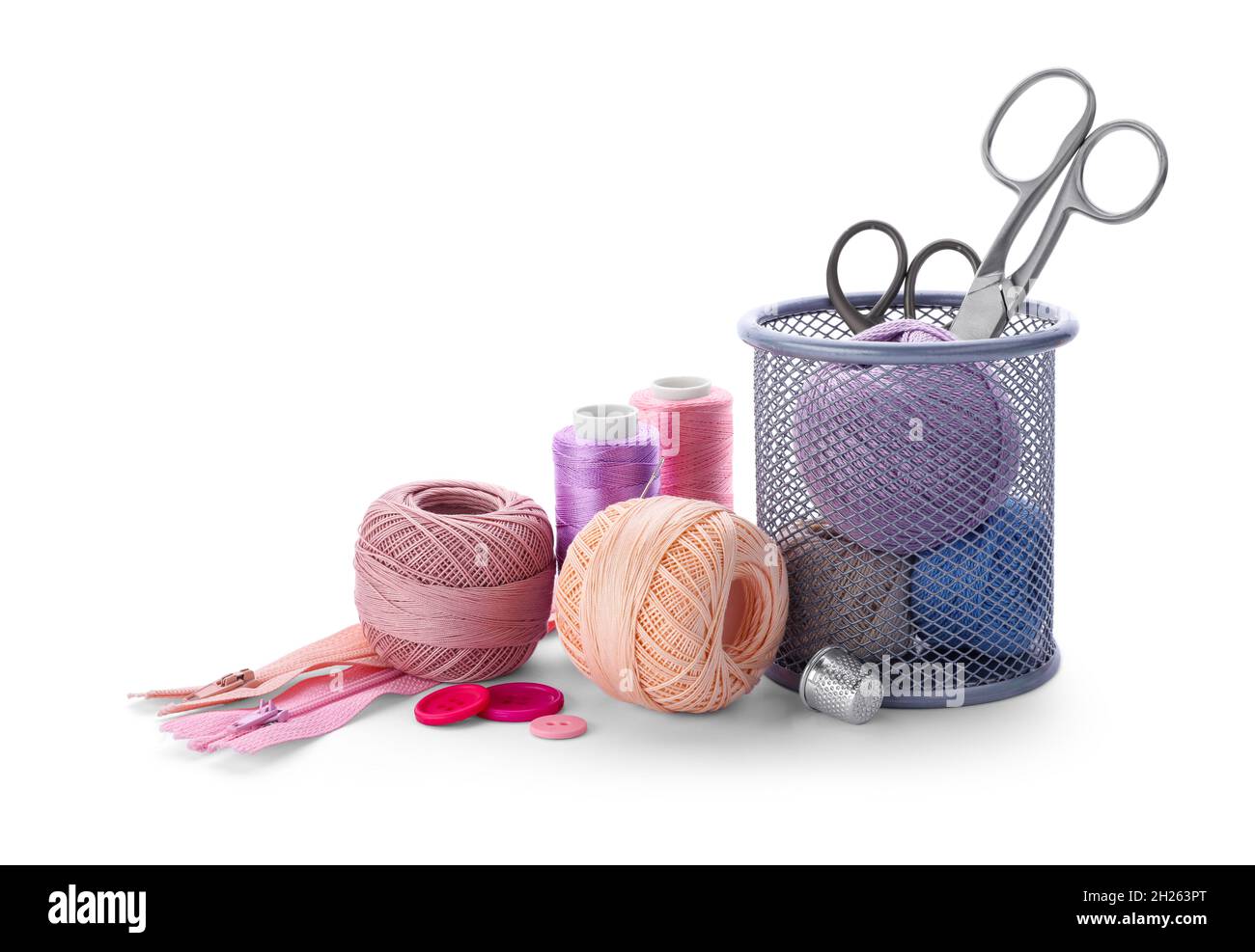 Color threads and sewing accessories on white background Stock Photo ...