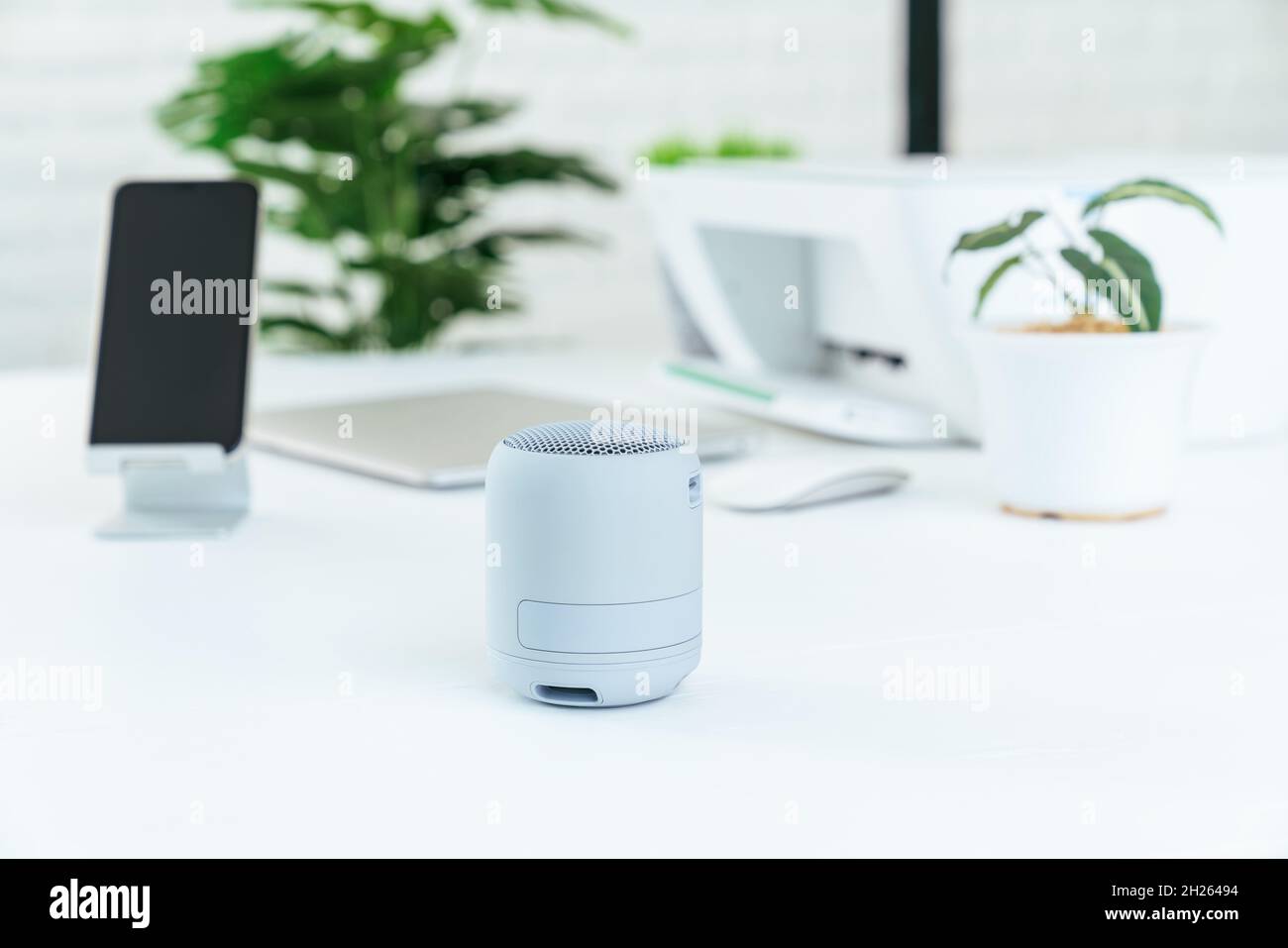 small bluetooth speaker portable on workspace Stock Photo