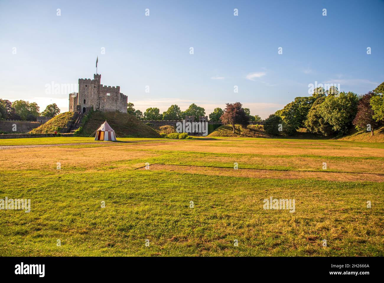 Norman Keep, and battlements with tent in the foreground of the gardens Cardiff Castle,Panoramic, Autumn, Cardiff, Wales, UK Stock Photo