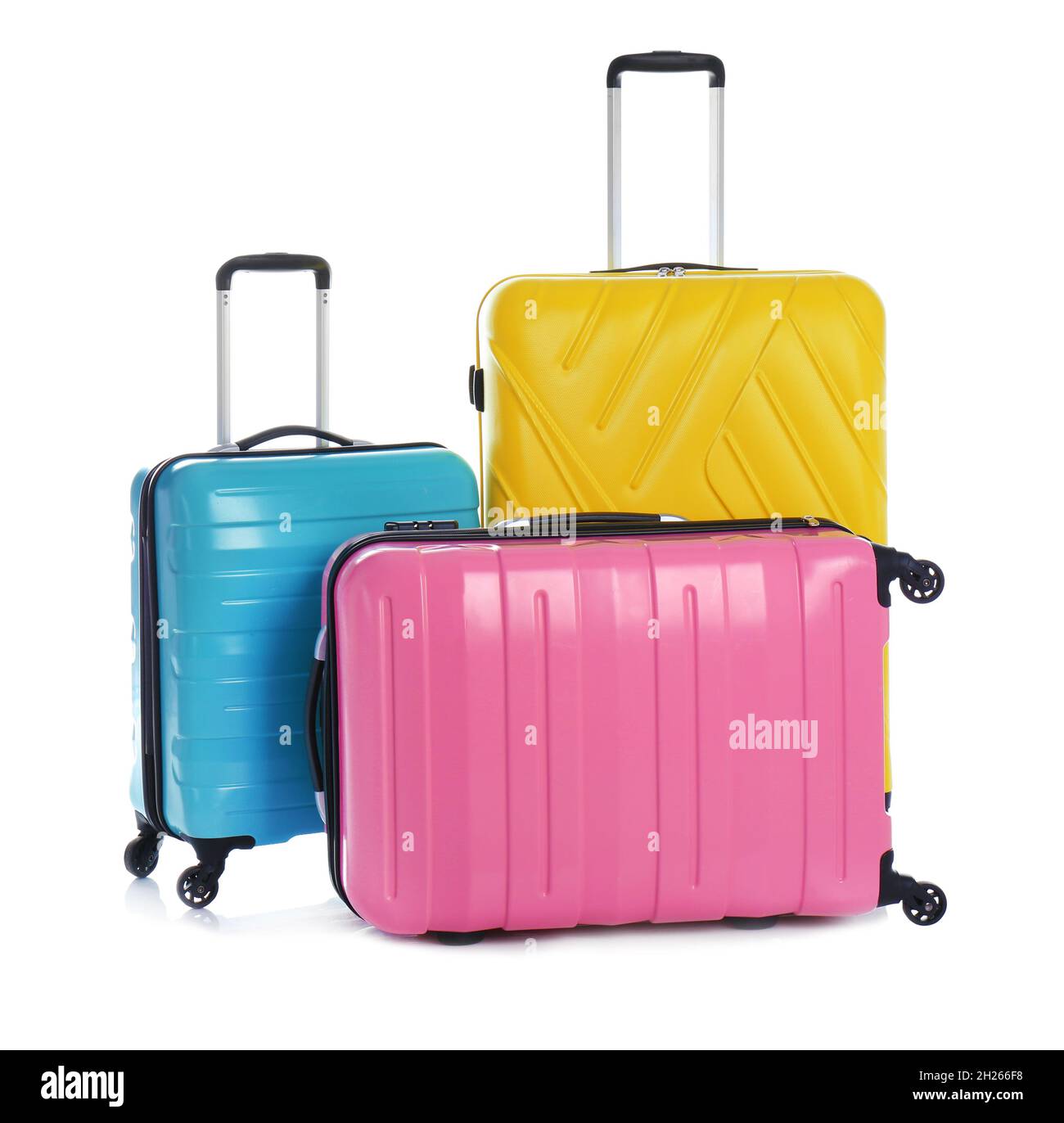 Modern suitcases for travelling on white background Stock Photo Alamy
