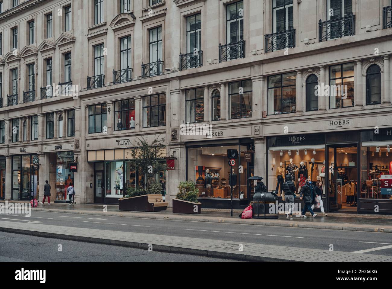London, UK - October 02, 2021: Few people walking past the open shops on  quiet Regent Street, a major and typically busy shopping street in the West  E Stock Photo - Alamy