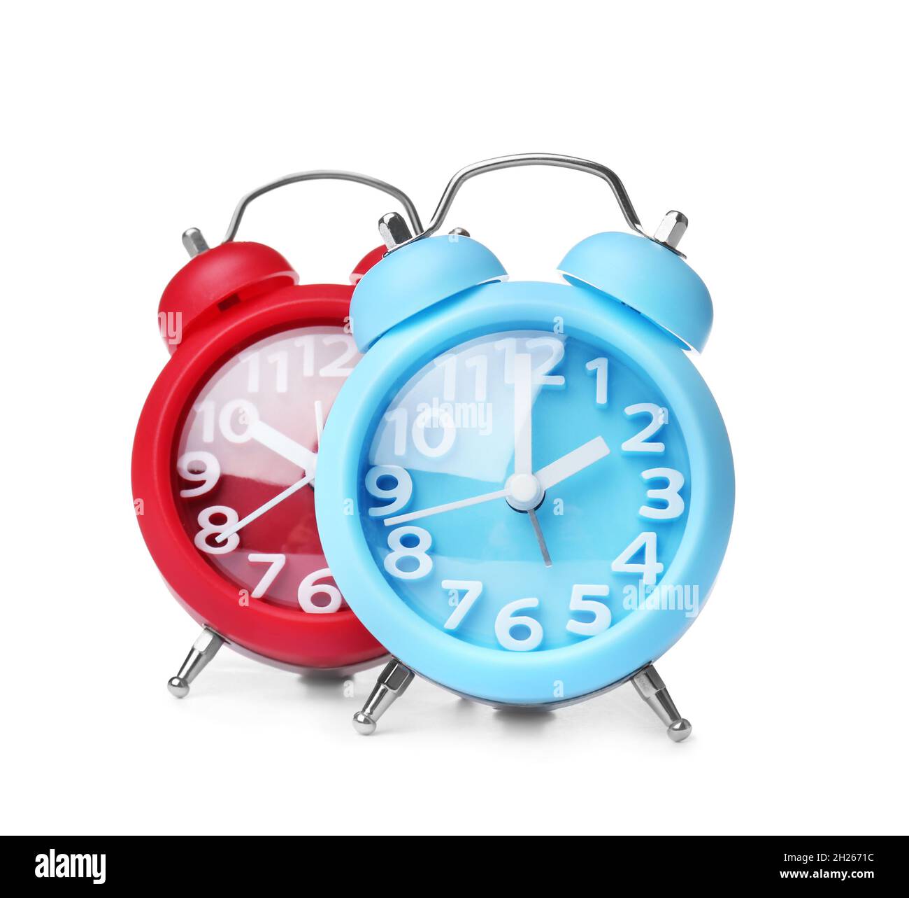 Alarm clocks on white background. Time change concept Stock Photo Alamy
