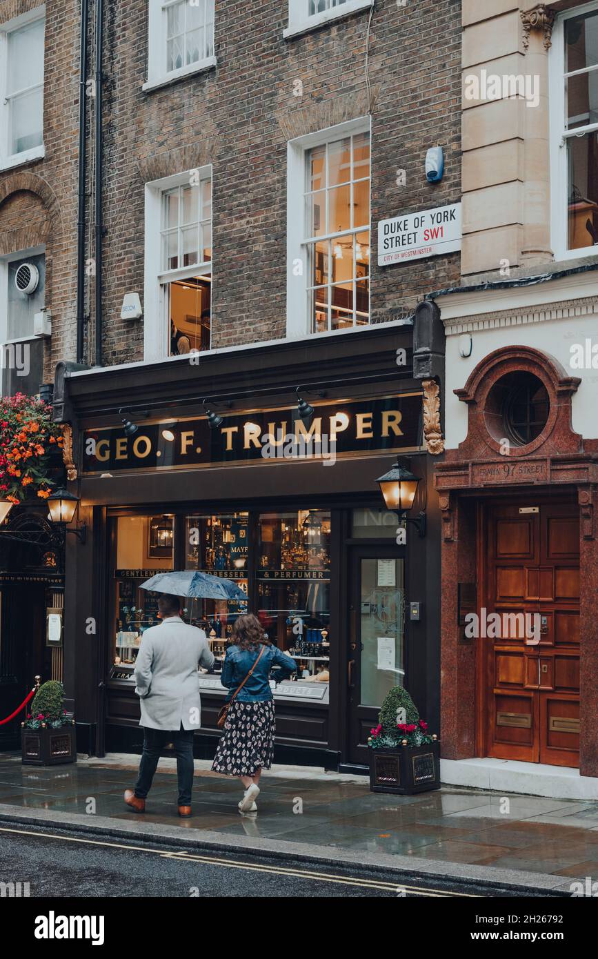 London, UK - October 02, 2021: Geo F. Trumper shop in St. James, people outside. Geo. F. Trumper is a British men's barber and perfumer in London, whi Stock Photo