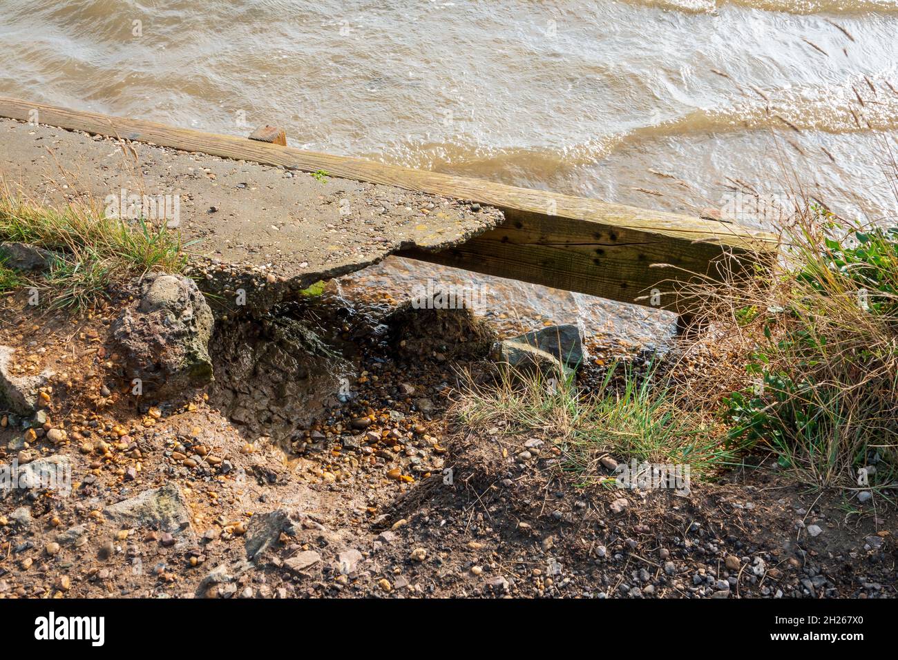 Close up detail of water erosion on a riverbank Stock Photo