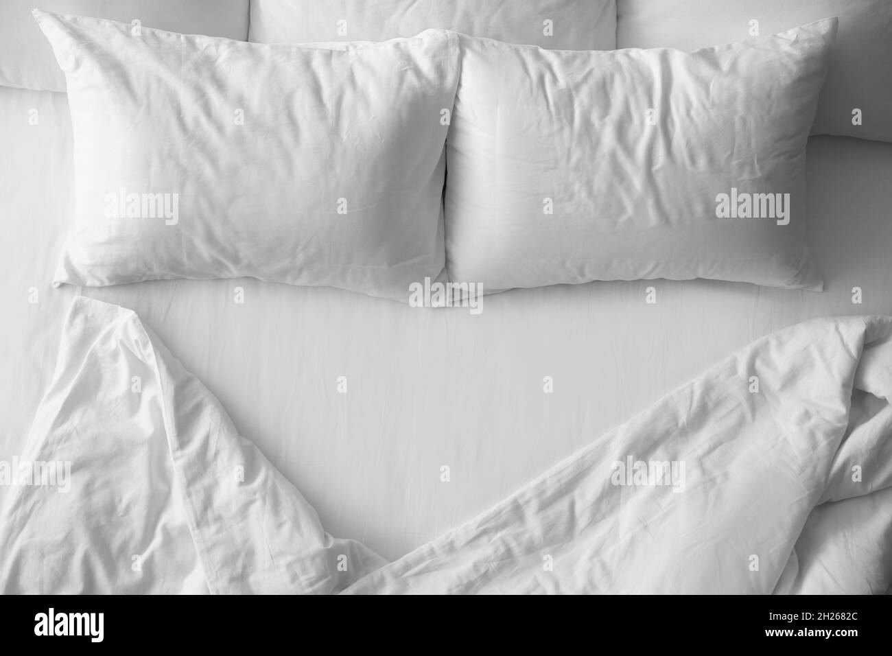 Soft pillows on comfortable bed, top view Stock Photo Alamy