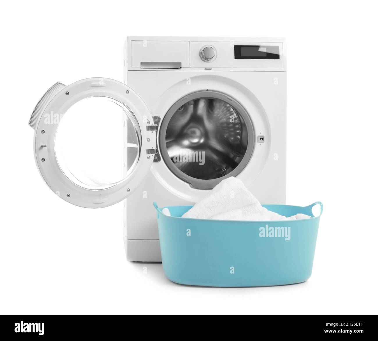 Modern washing machine and basket with laundry on white background ...