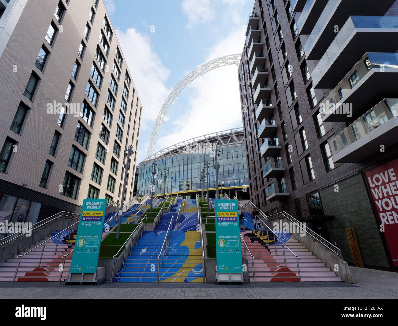 Wembley, Greater London, England, October 12 2021: Multi coloured stairs leading to Wembley Stadium, a football stadium for the national English team. Stock Photo