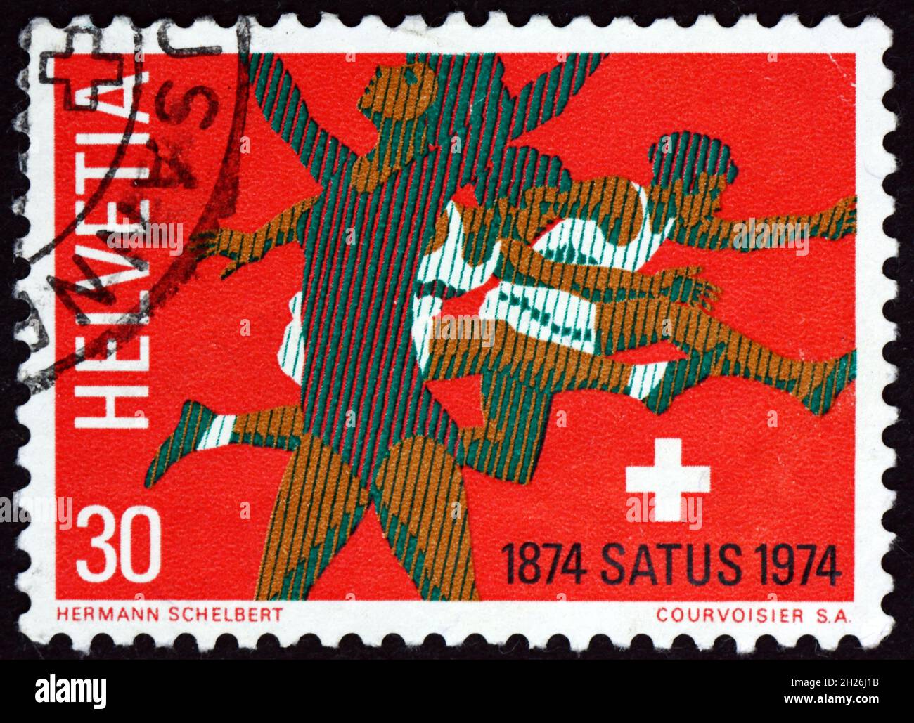 SWITZERLAND - CIRCA 1974: a stamp printed in Switzerland shows gymnast and hurdlers, centenary of Swiss workers gymnast and sports association, circa Stock Photo