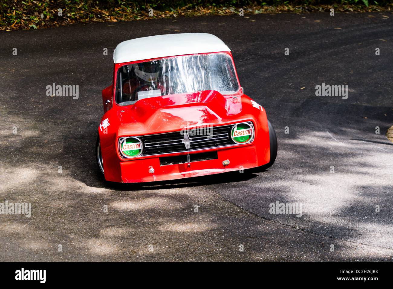 Racing Minis at Wiscombe Park Hillclimb in Devon UK. All are specially modified to suit the demands of racing against the clock on a 900yd uphill sprint Stock Photo