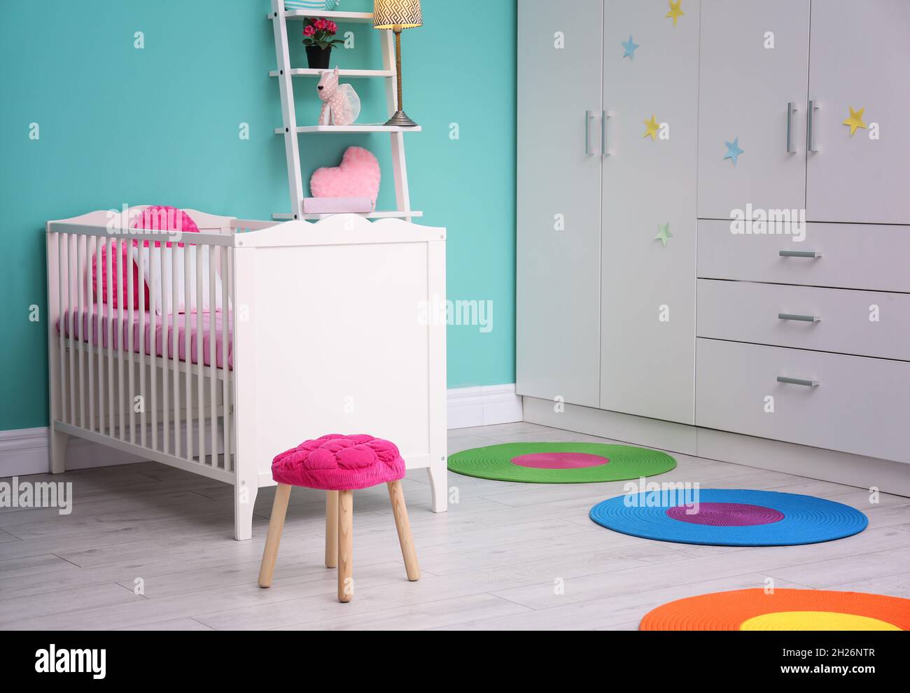 Light baby room interior with crib Stock Photo Alamy