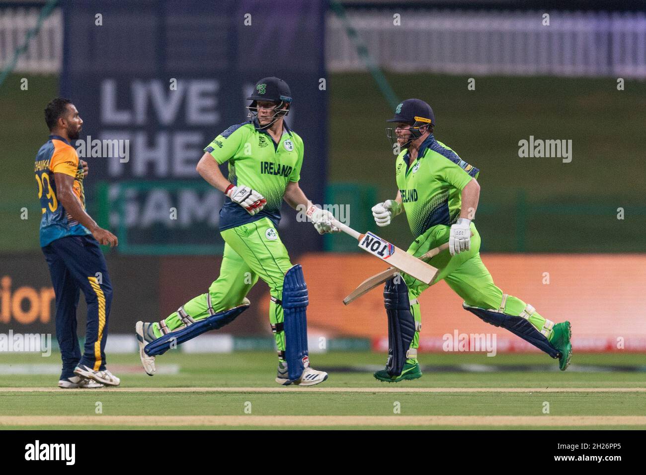 Kevin O'Brien (left) and Paul Stirling of Ireland (right) during the ICC Mens T20 World Cup match between Sri Lanka and Ireland at Sheikh Zayed Stadium, Abu Dhabi, UAE on 20 October 2021. Photo by Grant Winter. Editorial use only, license required for commercial use. No use in betting, games or a single club/league/player publications. Credit: UK Sports Pics Ltd/Alamy Live News Stock Photo