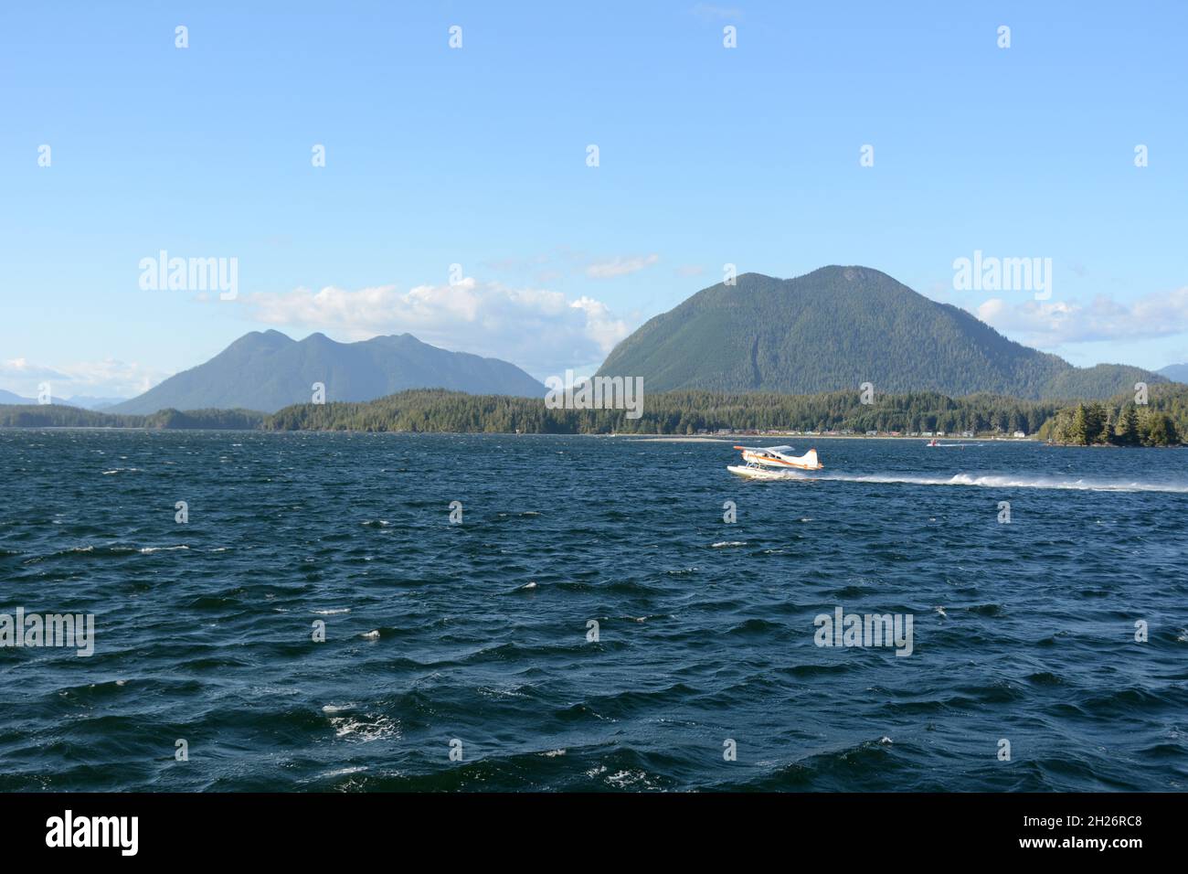 A float plane off The Nuu-chah-nulth First Nation village of Opitsaht, in Clayoquot Sound, near Tofino, Vancouver Island, British Columbia, Canada. Stock Photo