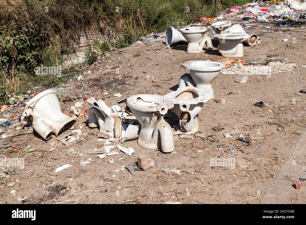 Rubbish with toilet bowls in Agra, Uttar Pradesh state, India Stock
