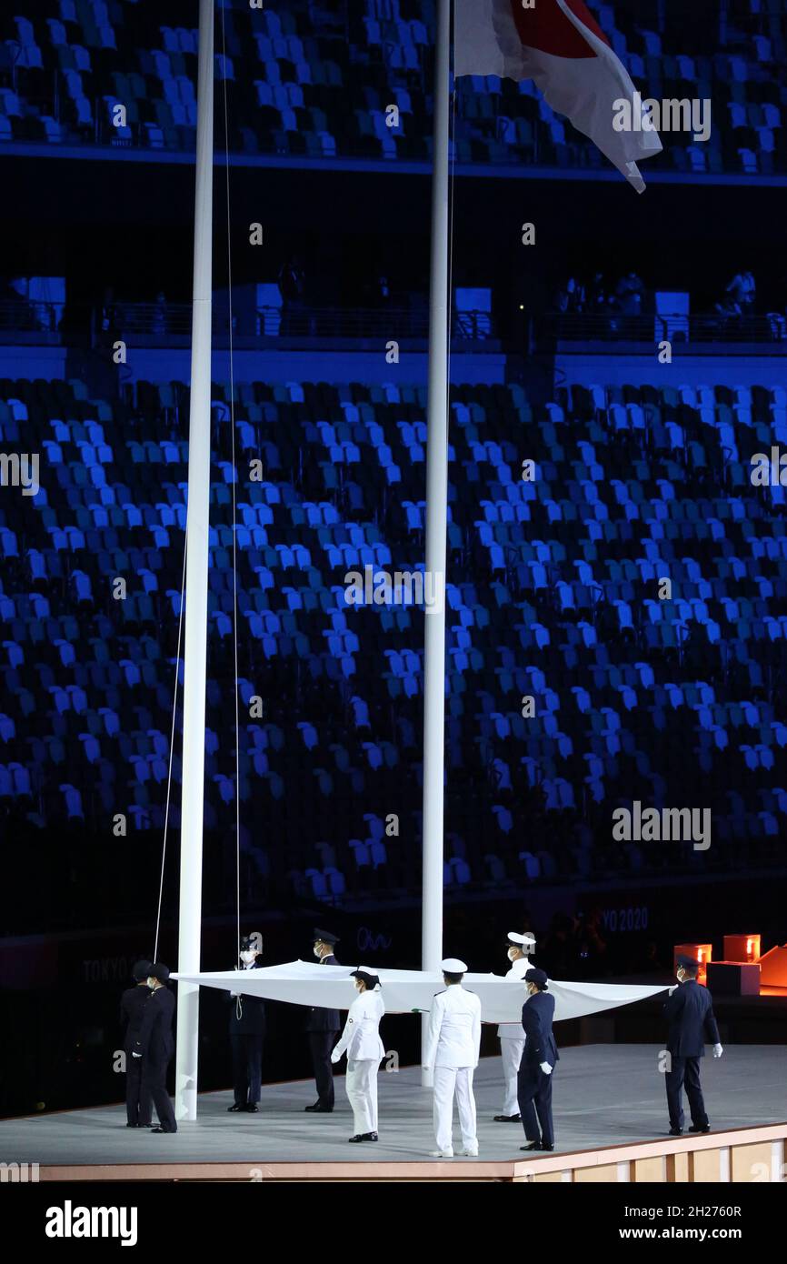 JULY 23rd, 2021 - TOKYO, JAPAN: the Olympic Flag is handed to members of  Army Forces of Japan before being raised during the Opening Ceremony of the  T Stock Photo - Alamy