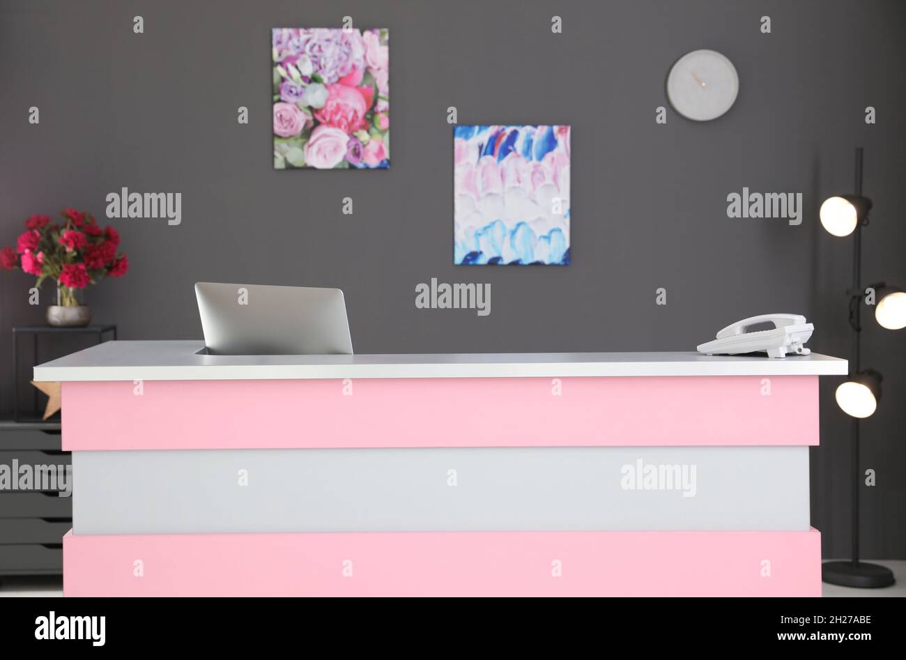 Beauty salon interior with computer on desk. Receptionist workplace