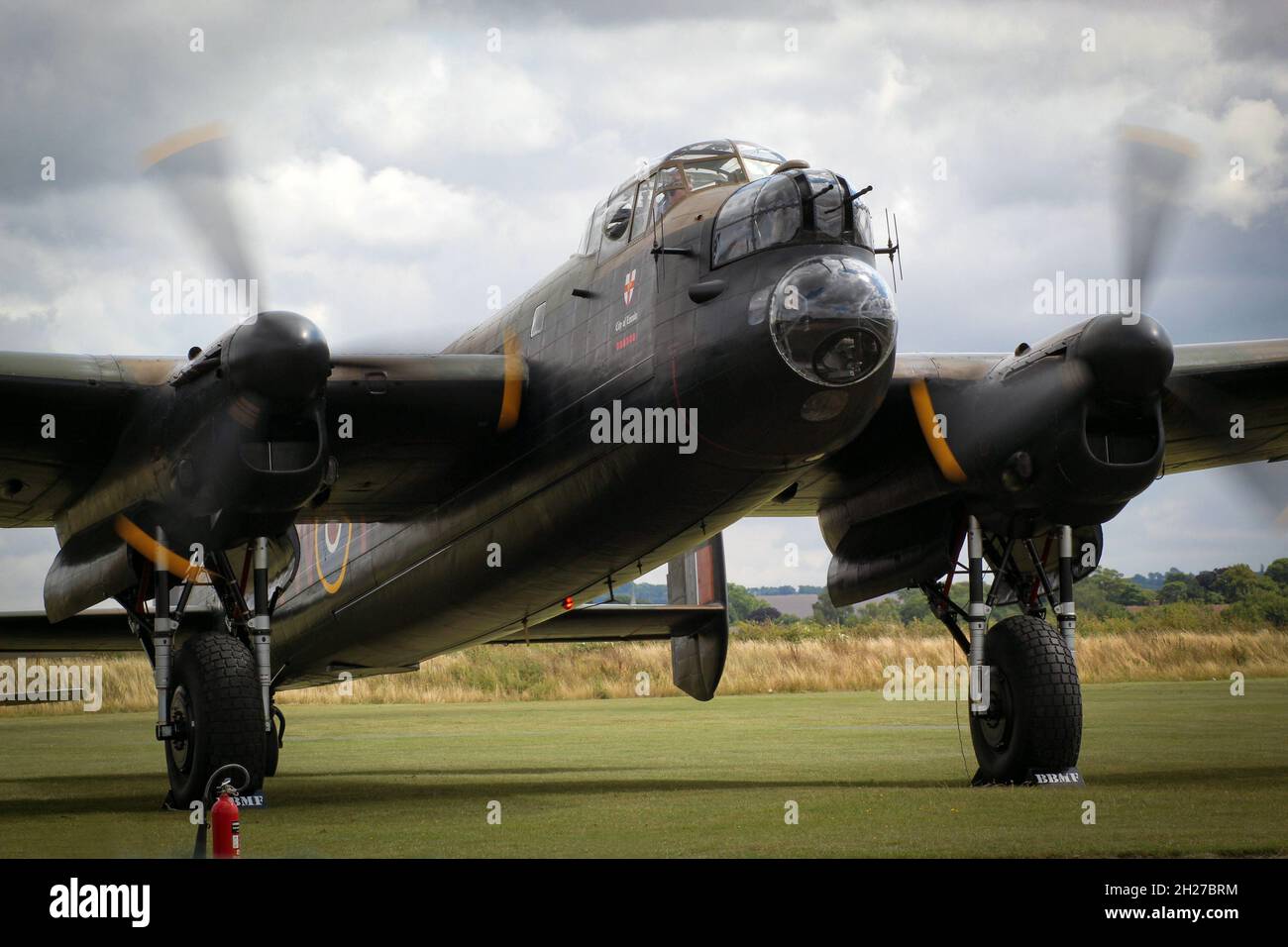 Battle of Britain, memorial flight Lancaster Bomber running engine checks at Duxford Airfield, Cambridgeshire Stock Photo