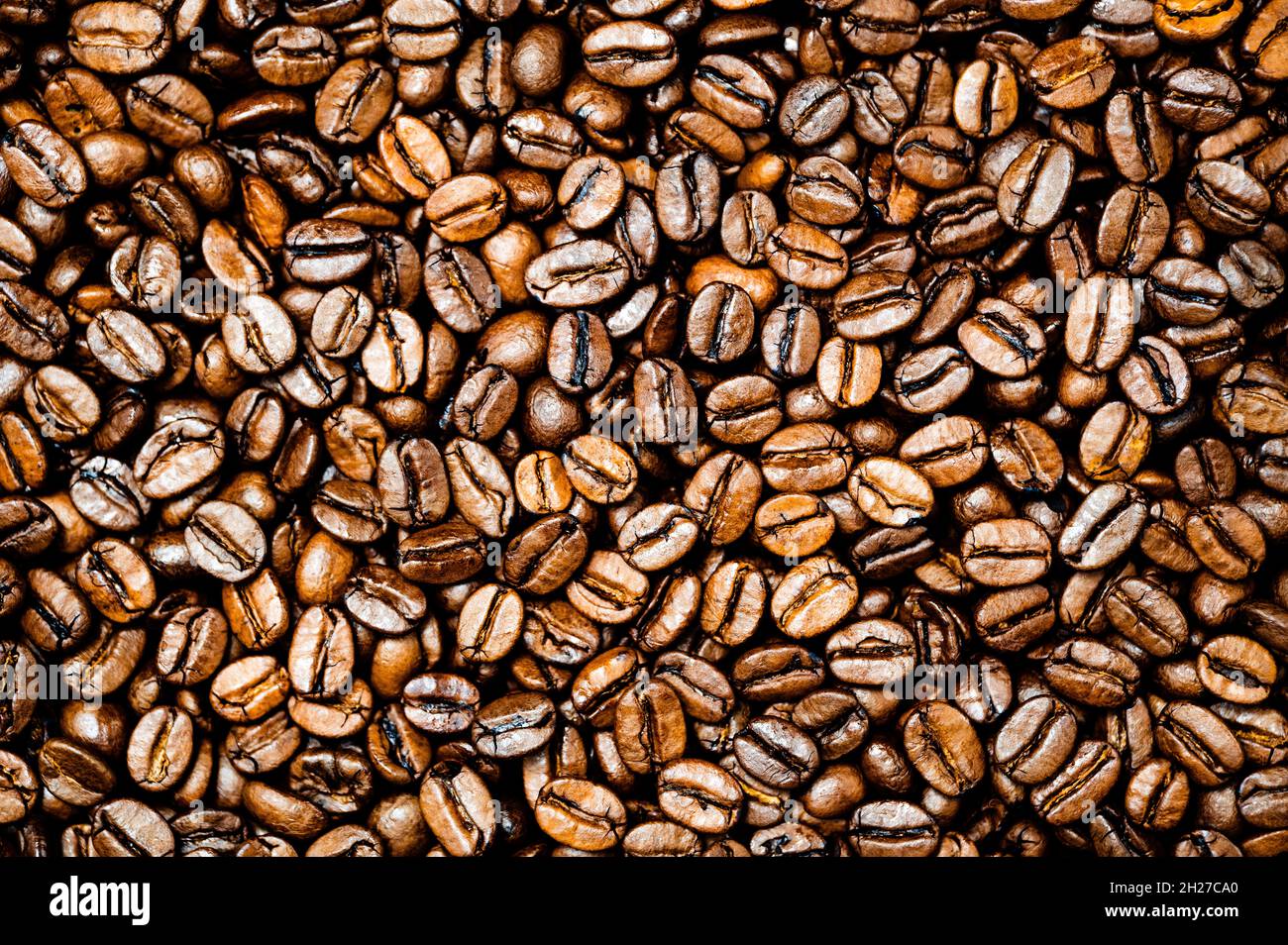 Roasted coffee or espresso beans background. Stock Photo
