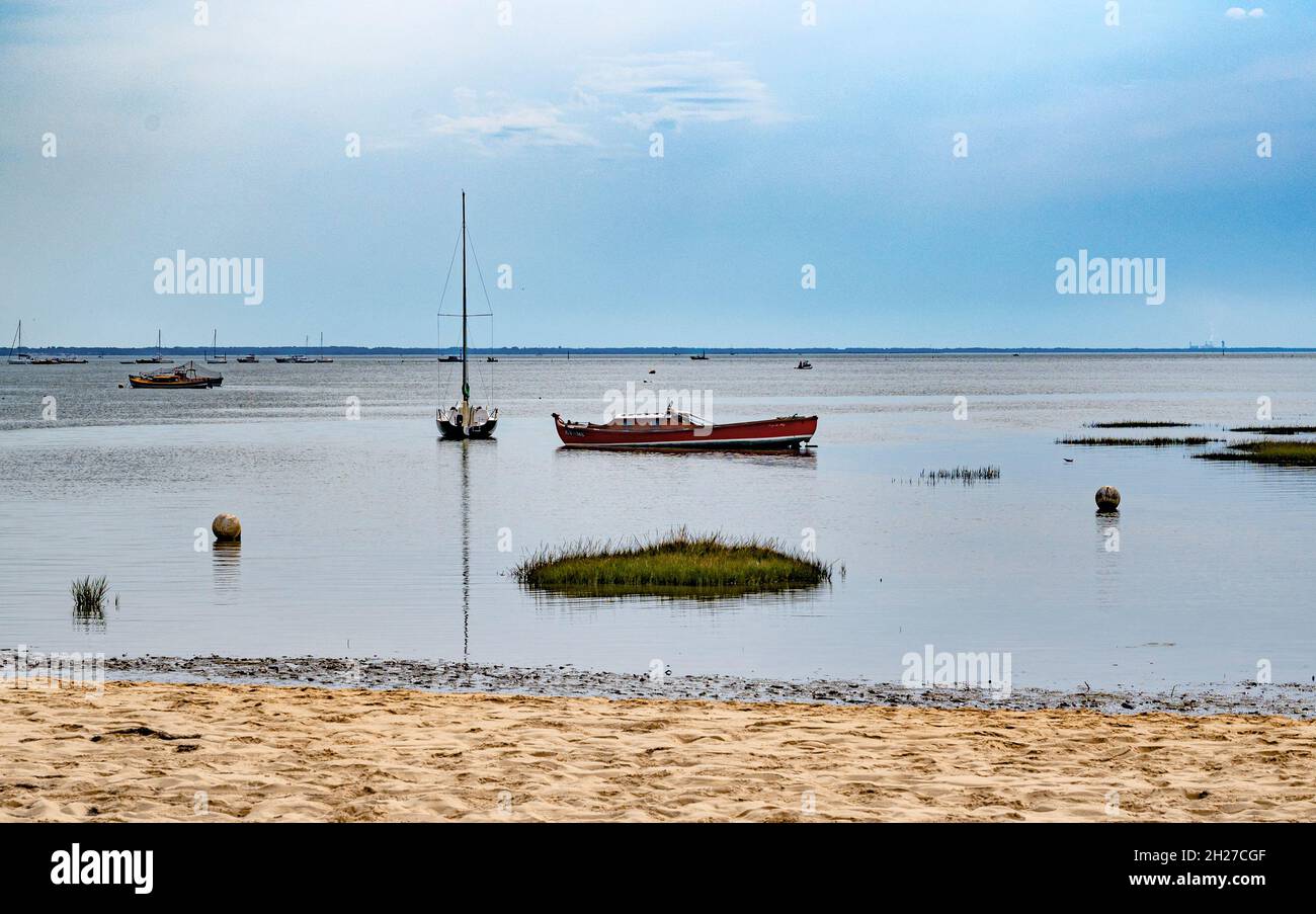Boats moored in the Bassin d'Arcachon at the village des pêcheurs, the oyster farmer's quarter of Cap Ferret, France Stock Photo