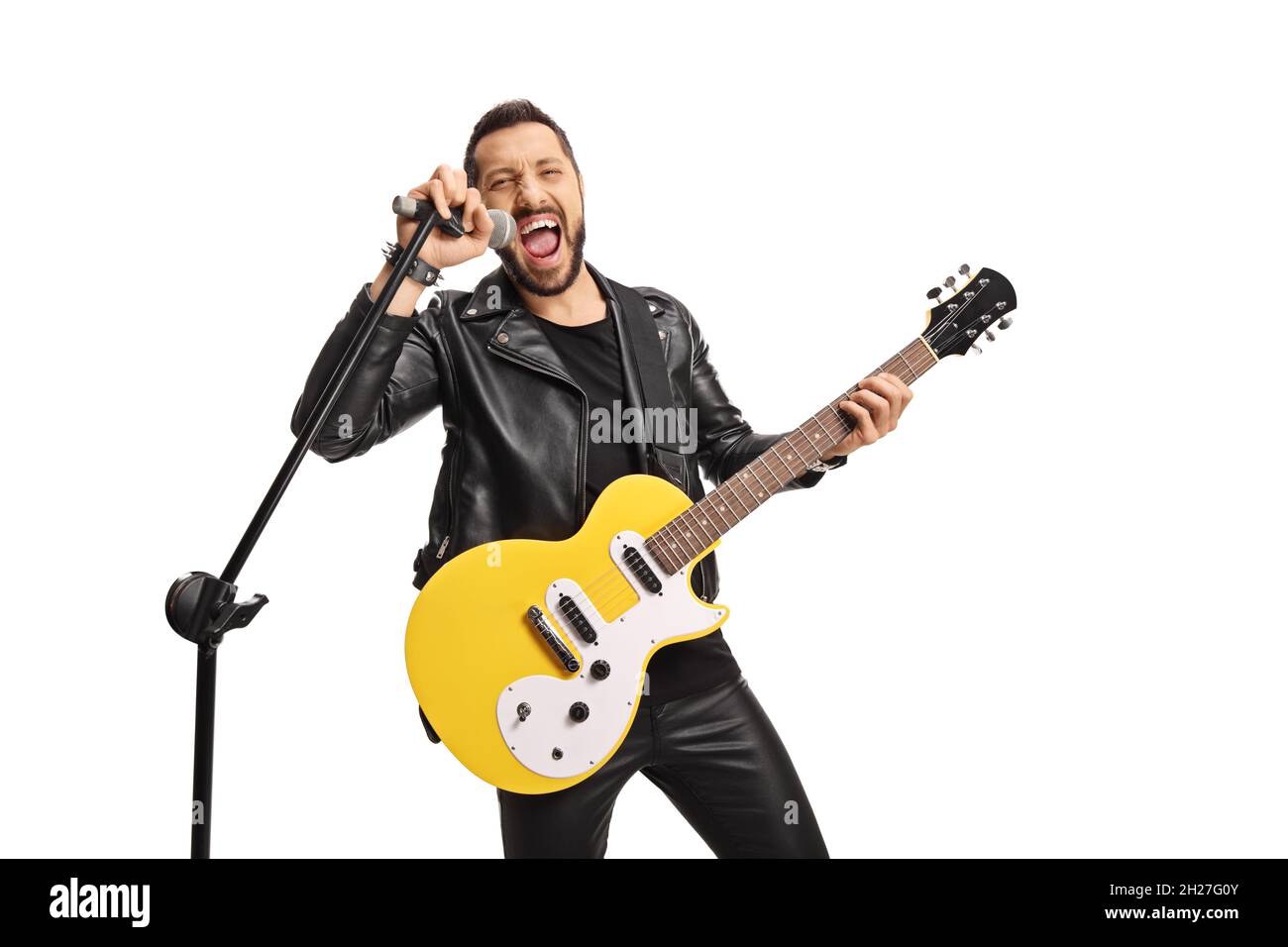 Male singer with a microphone and an electric guitar singing loud