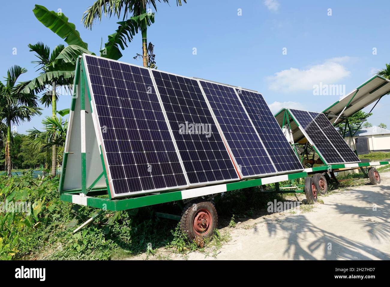 Portable Solar power panel station car for agricultural use. Solar power converting to electricity to help farmers in irrigation. Solar power generati Stock Photo