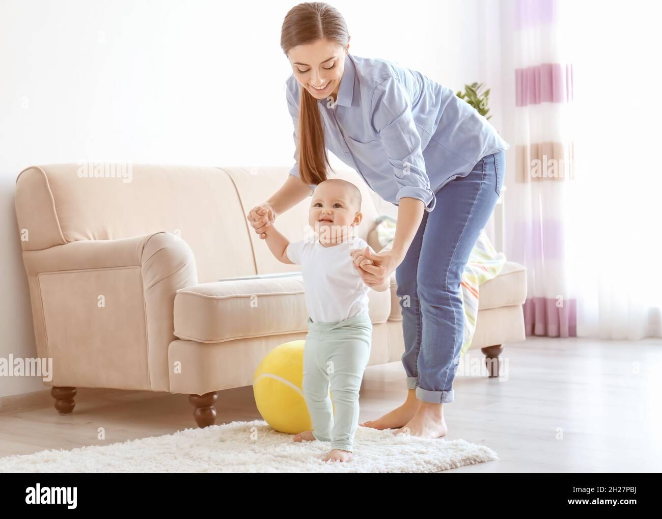 Mother crying baby walking hi-res stock photography and images - Alamy
