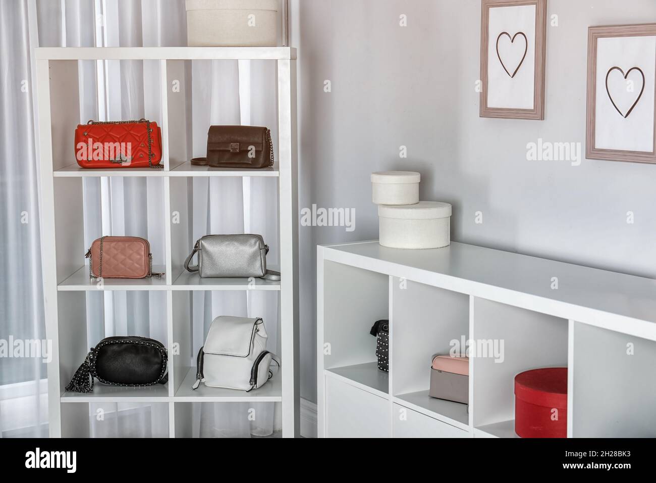 Wardrobe shelves with different stylish bags indoors. Idea for interior design Stock Photo Alamy