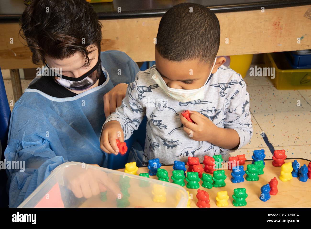 Child looking up at adult hires stock photography and images Alamy