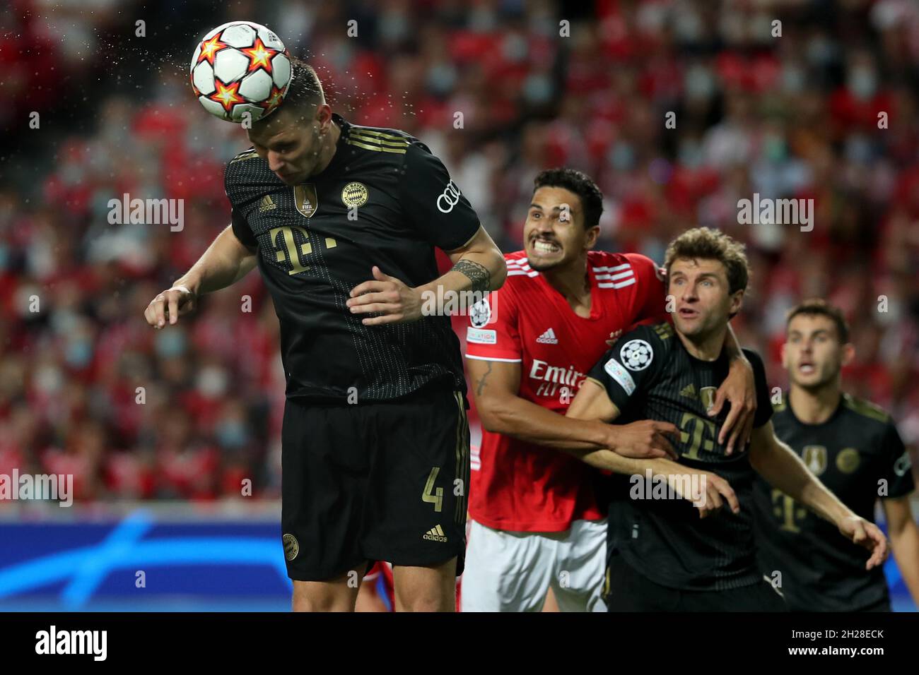 Lisbon, Portugal. 20th Oct, 2021. Niklas Sule of Bayern Muenchen heads the ball during the UEFA Champions League group E football match between SL Benfica and FC Bayern Muenchen at the Luz stadium in Lisbon, Portugal on October 20, 2021. (Credit Image: © Pedro Fiuza/ZUMA Press Wire) Stock Photo