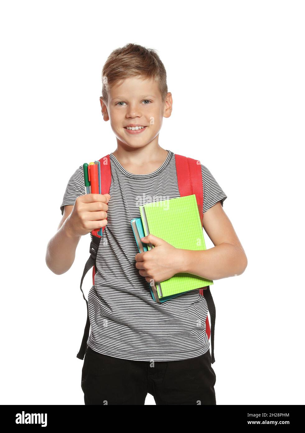Cute boy with school stationery on white background Stock Photo - Alamy
