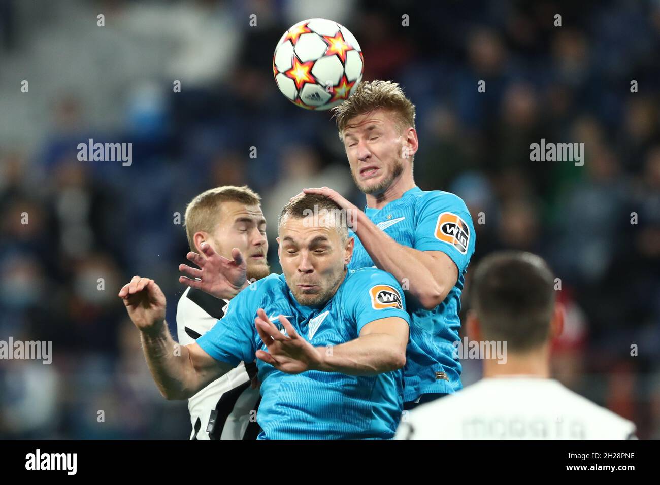 forward Artem Dzyuba of FC Zenit and defnder Dmitri Chistyakov of FC Zenit in action  during UEFA Champions League Group stage - Group H match FC Zenit v FC Juventus at Gazprom Arena in Saint Petersburg. SAINT PETERSBURG,  - OCTOBER 20: (Photo by Anatoliy Medved) Stock Photo